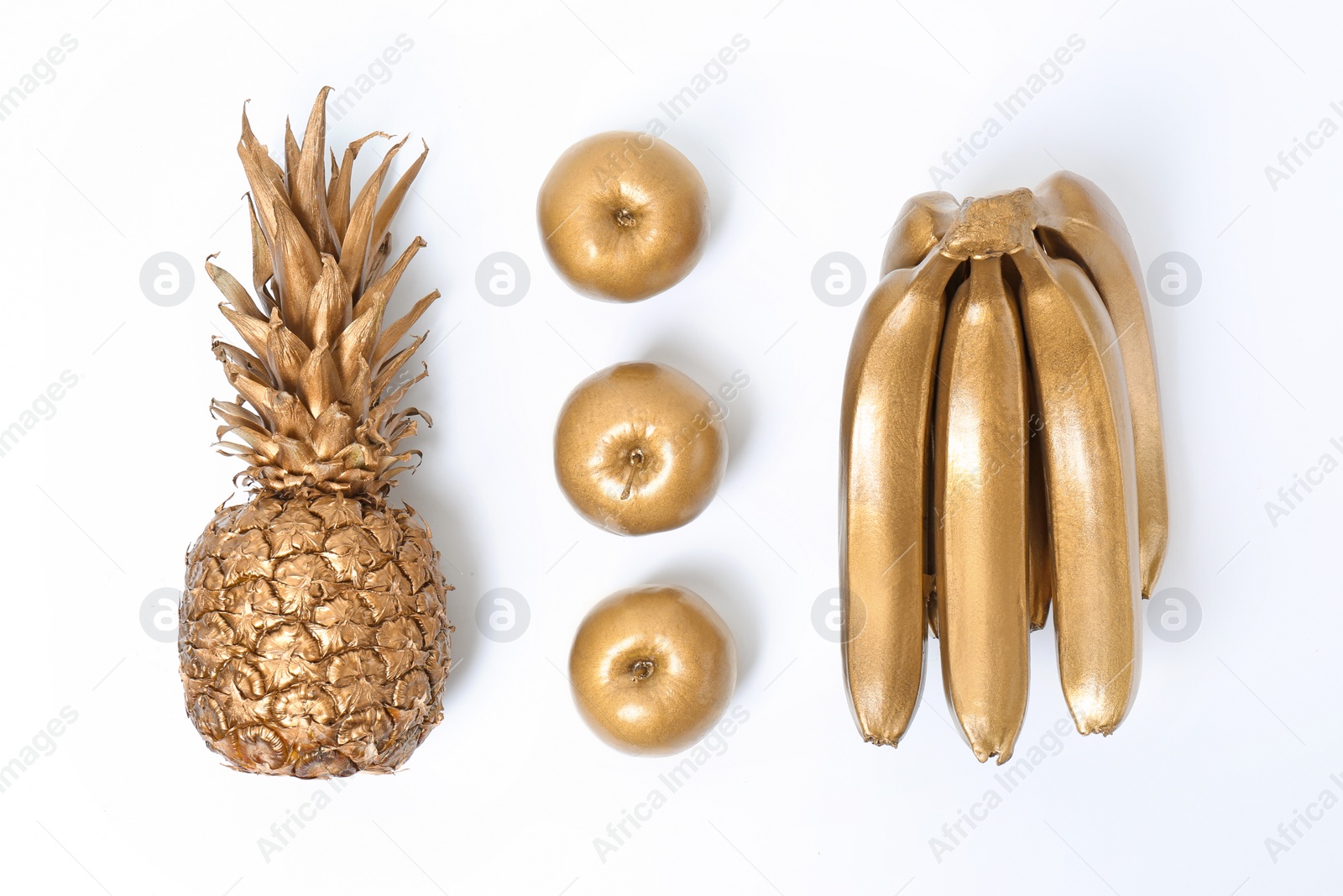 Photo of Composition with gold fruits on white background, top view