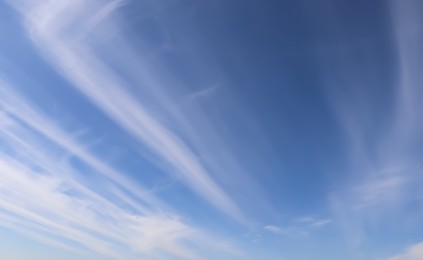 Beautiful fluffy white clouds in blue sky