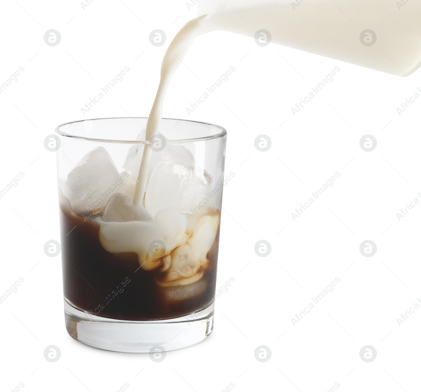 Photo of Pouring milk into glass of iced coffee on white background