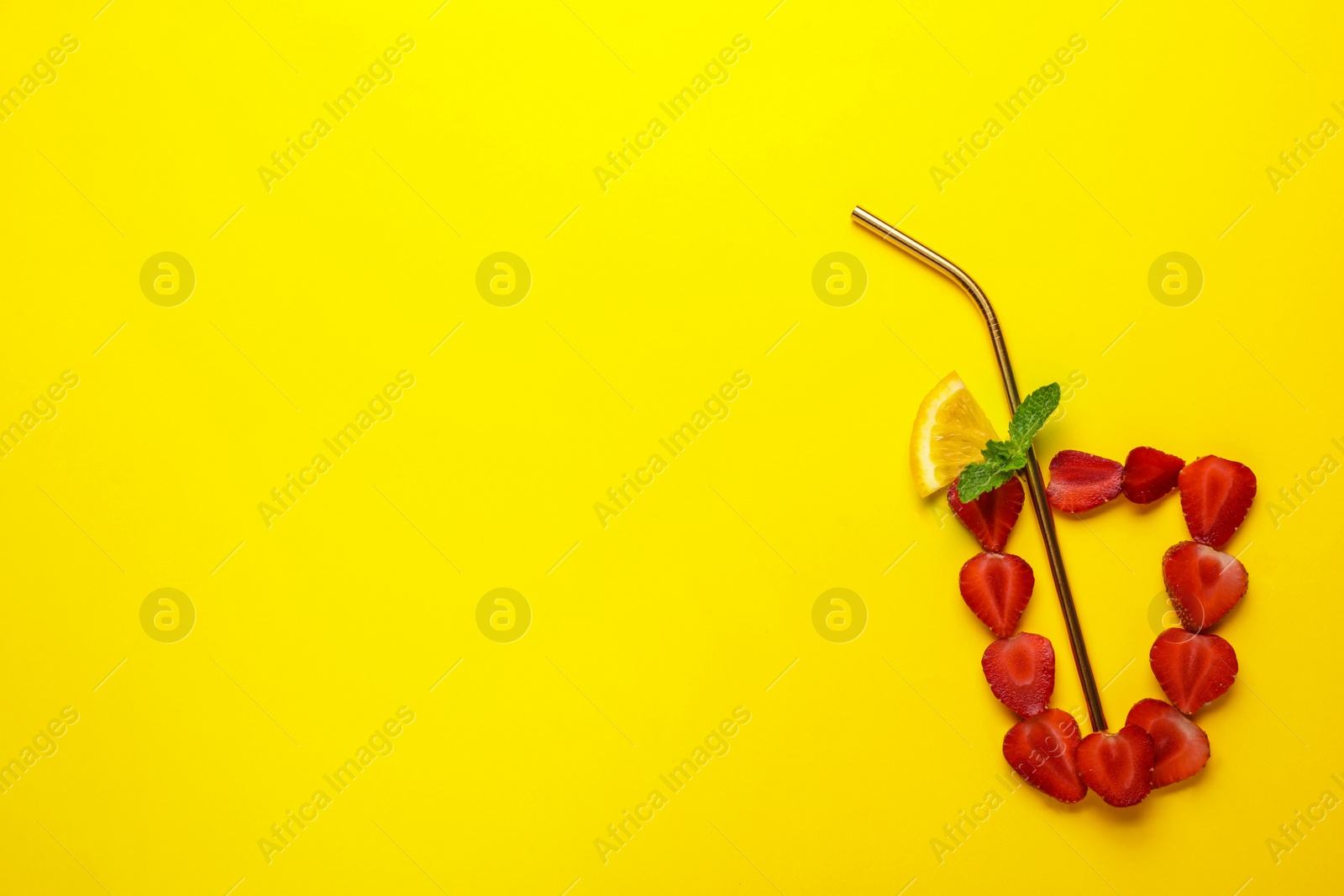 Photo of Creative flat lay composition with strawberries and citrus slice as summer cocktail on color background, space for text