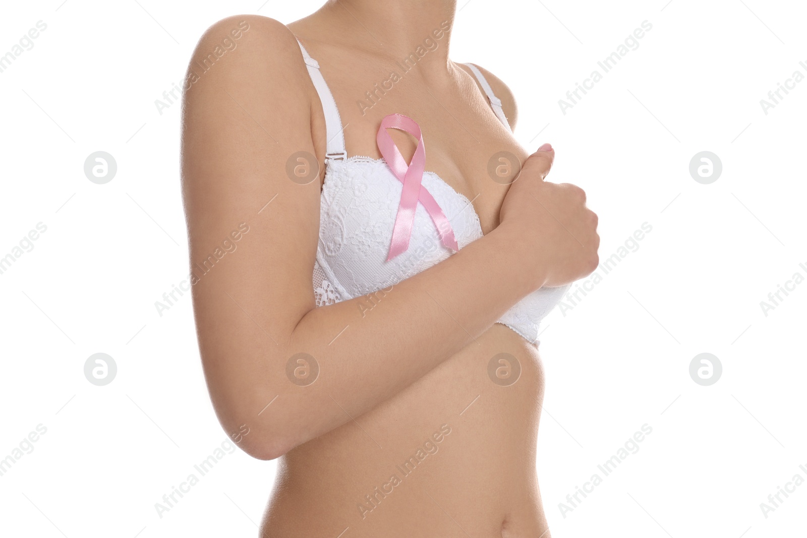 Photo of Woman with pink ribbon on white background, closeup. Breast cancer awareness