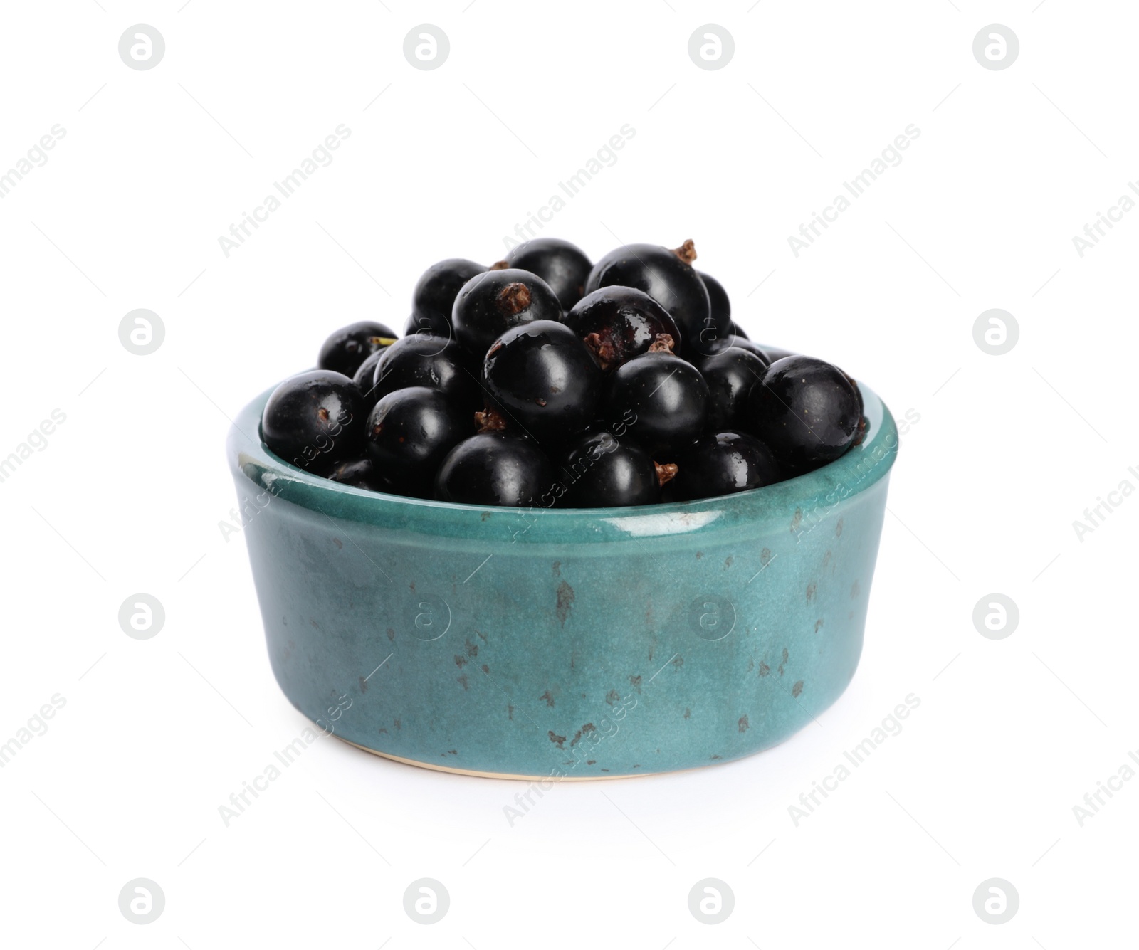 Photo of Ripe blackcurrants in bowl isolated on white