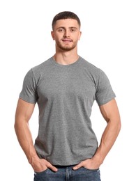 Photo of Man wearing grey t-shirt on white background. Mockup for design