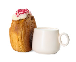 Photo of Round croissant with cream and cup of drink isolated on white. Tasty puff pastry