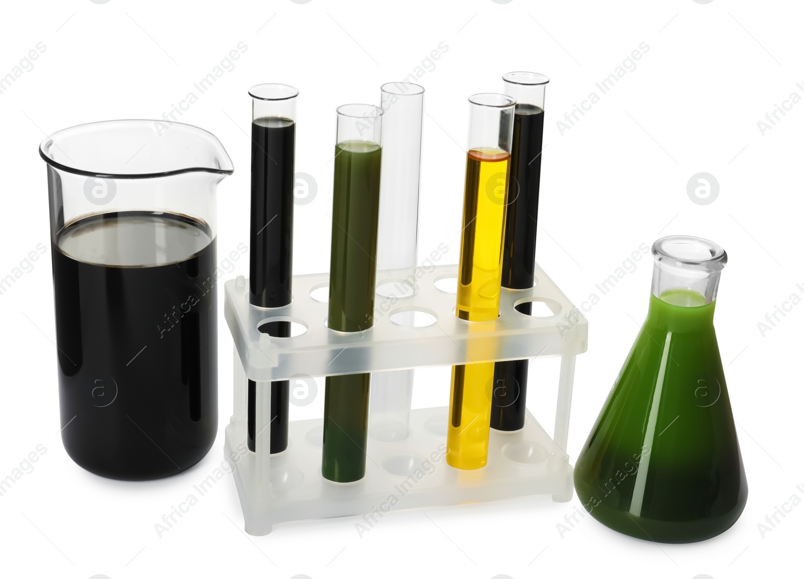 Photo of Test tubes, beaker and flask with different types of oil isolated on white