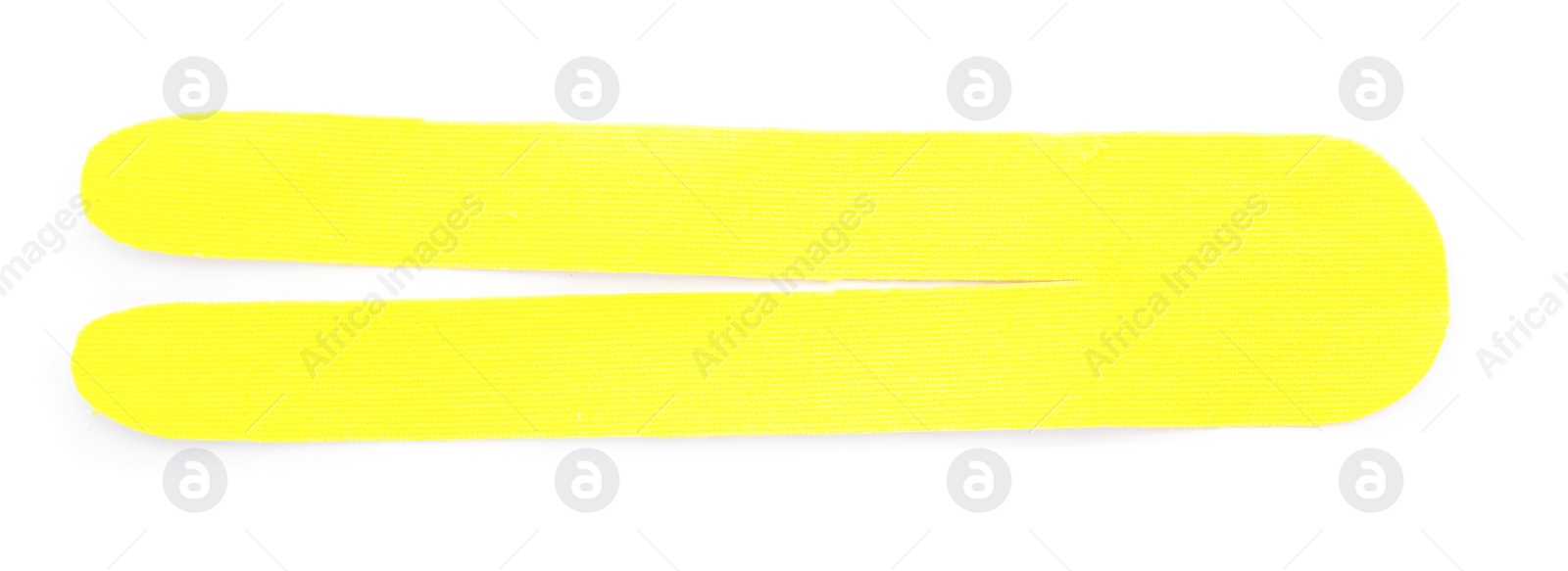 Photo of Yellow kinesio tape piece on white background, top view