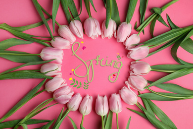 Image of Beautiful tulips on pink background, flat lay. Hello spring