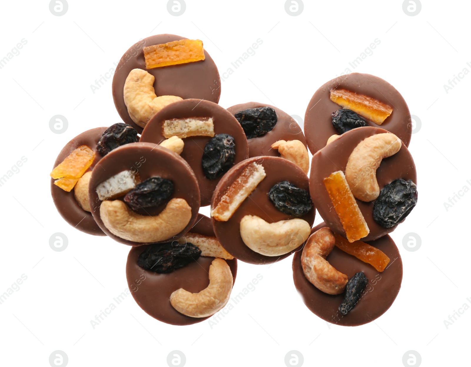 Photo of Delicious chocolate candies with cashew nuts and dried fruits on white background, top view