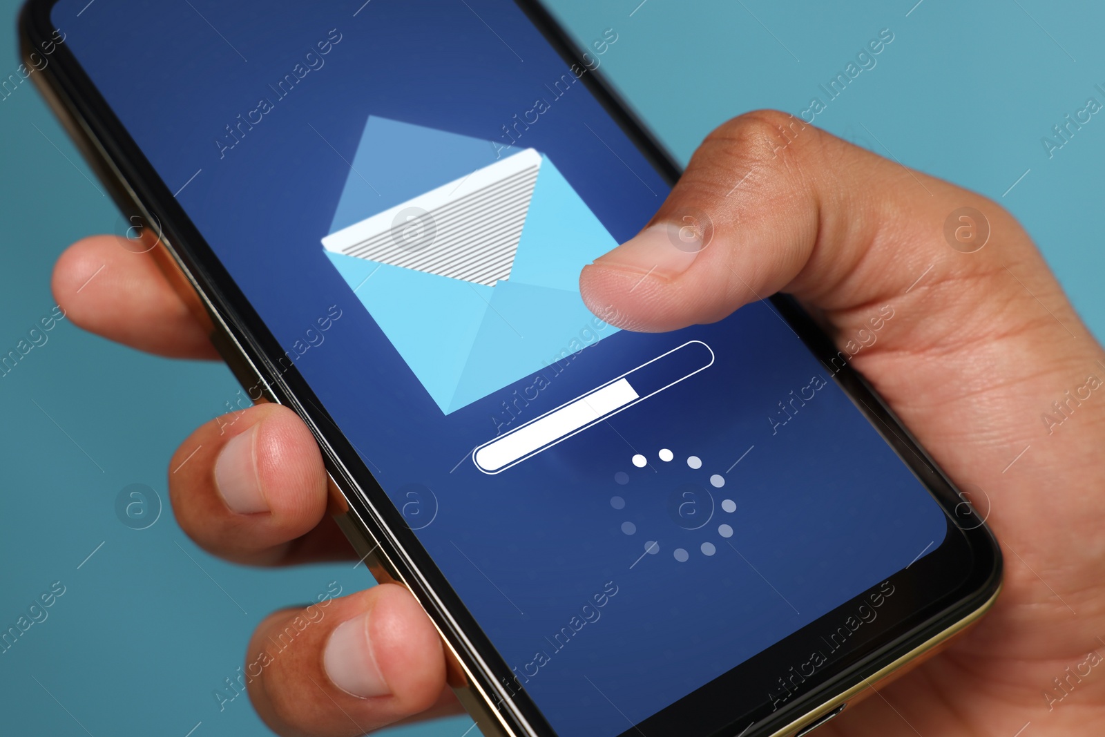 Image of Got new message. Man using smartphone on light blue background, closeup