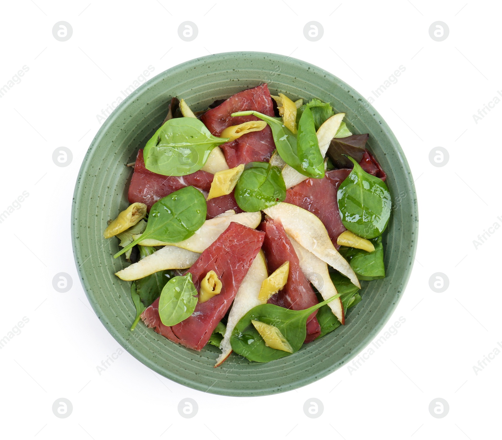 Photo of Delicious bresaola salad in bowl isolated on white, top view