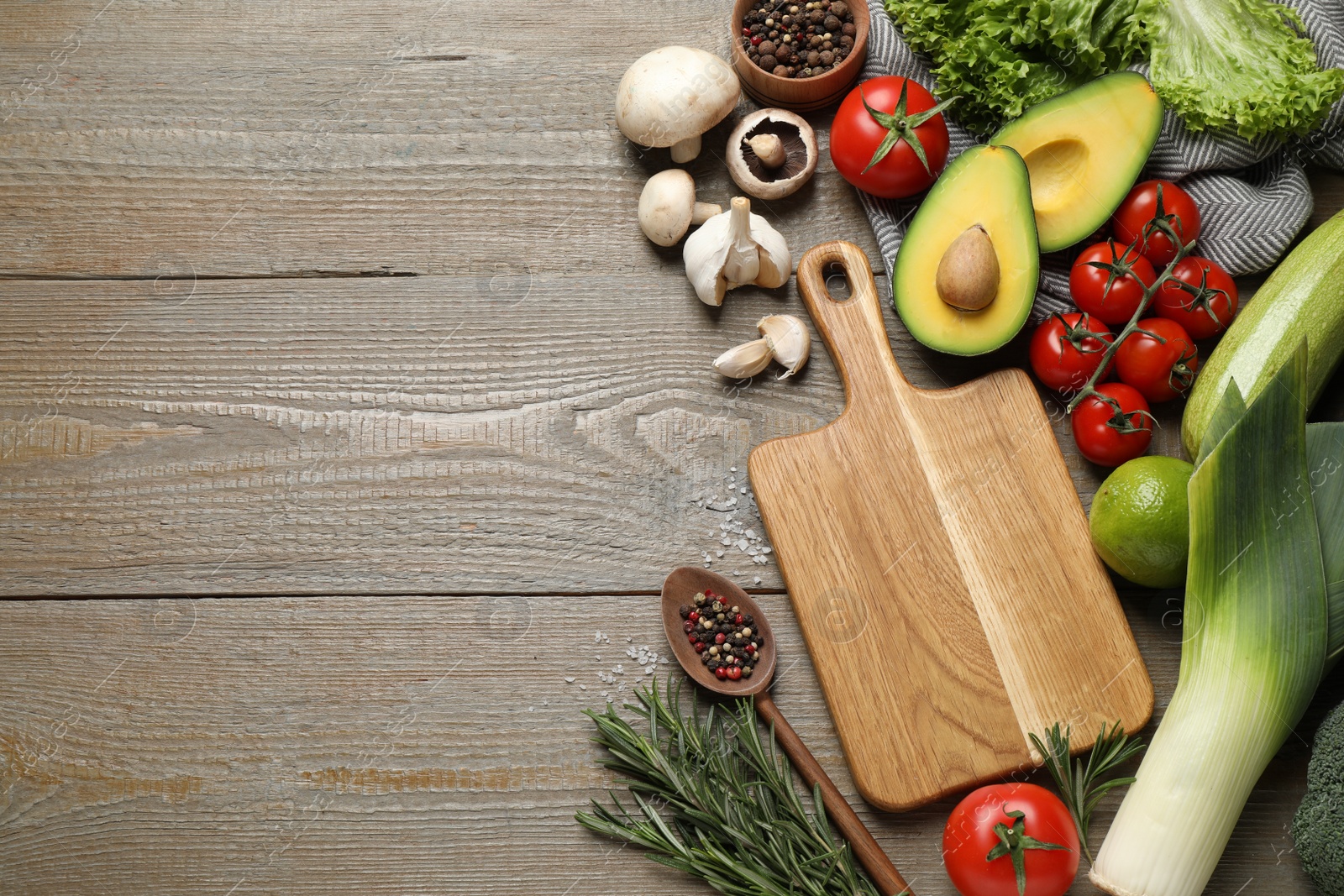 Photo of Flat lay composition with fresh products on wooden table, space for text. Healthy cooking