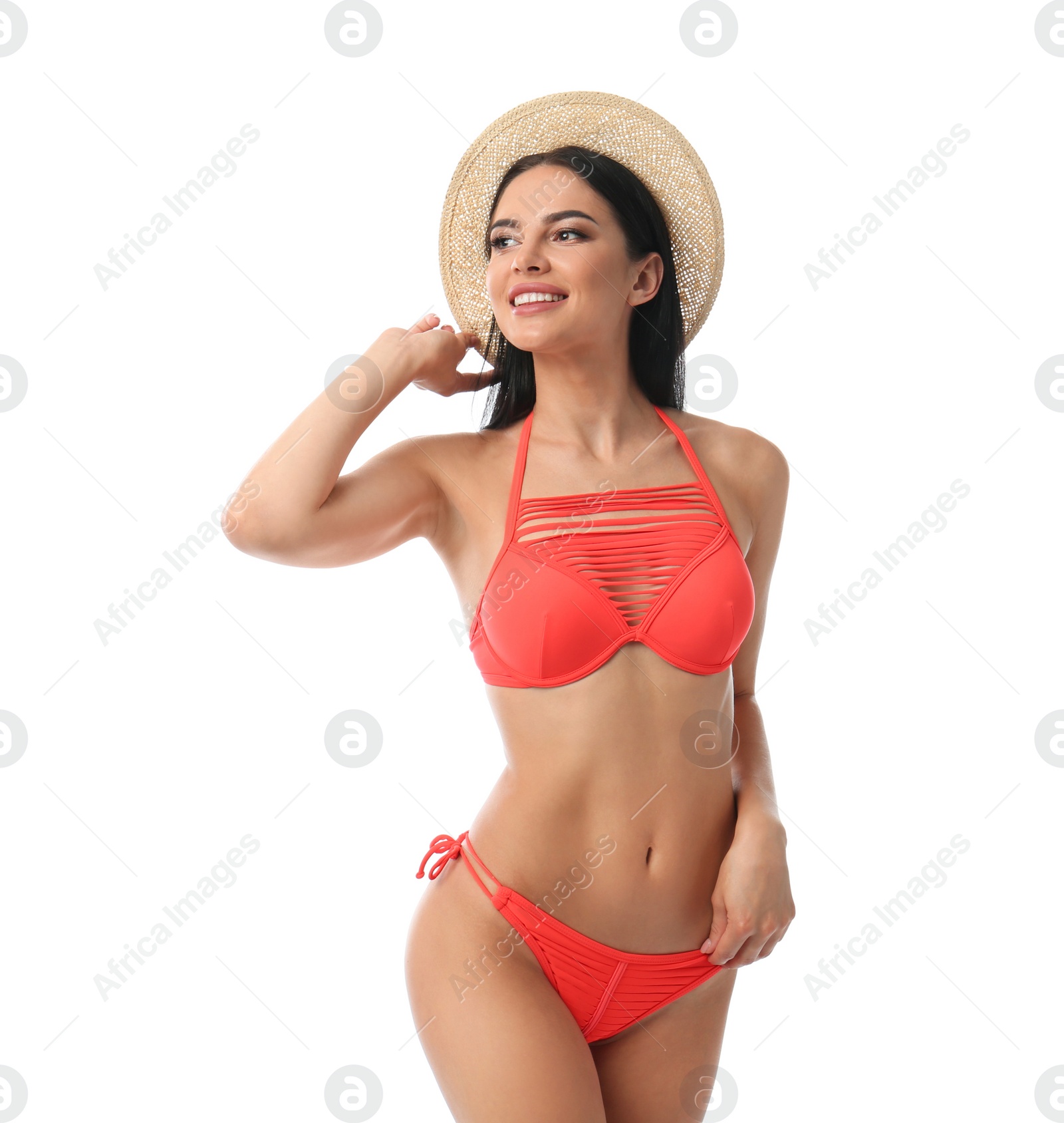 Photo of Beautiful young woman in stylish bikini with hat on white background