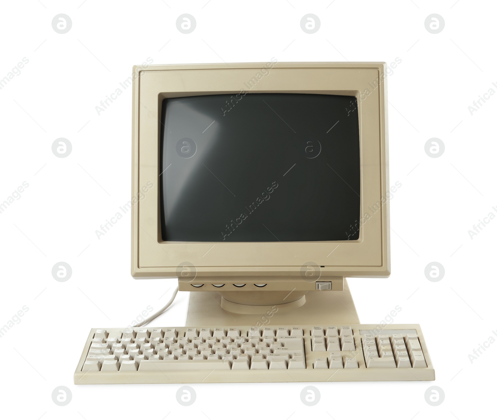 Photo of Old computer monitor and keyboard on white background