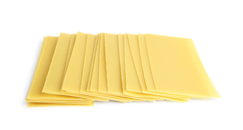 Uncooked lasagna sheets on white background. Italian cuisine