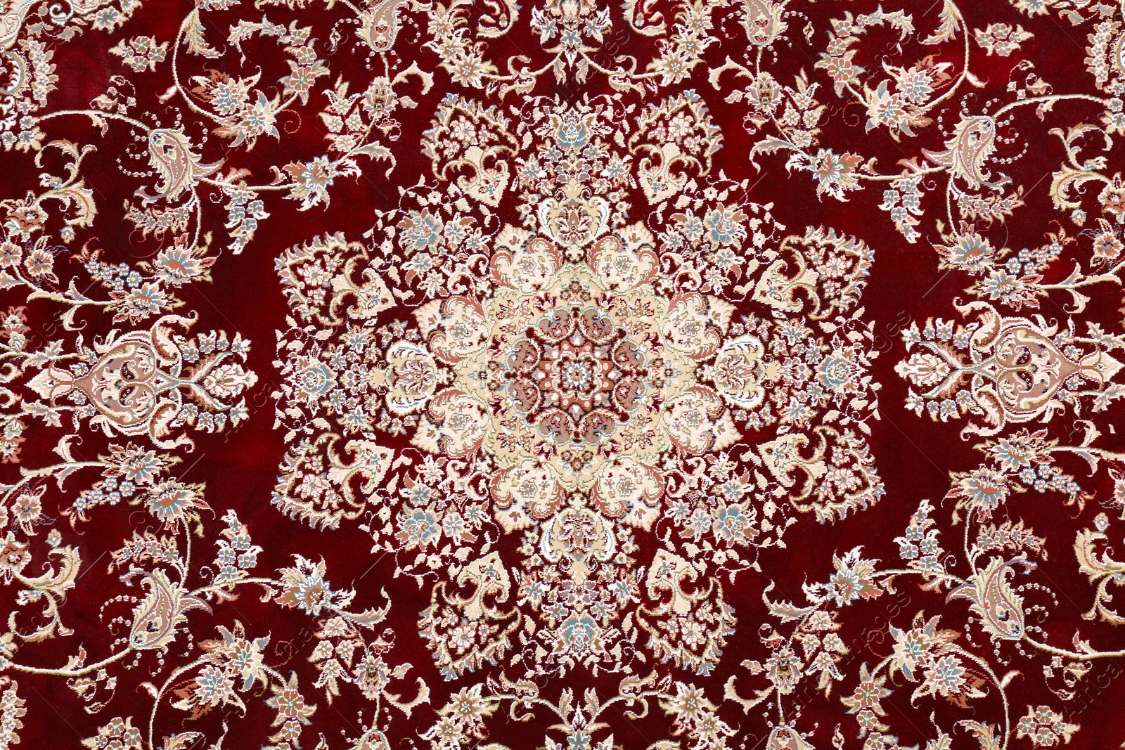 Photo of Soft carpet with beautiful pattern as background, top view