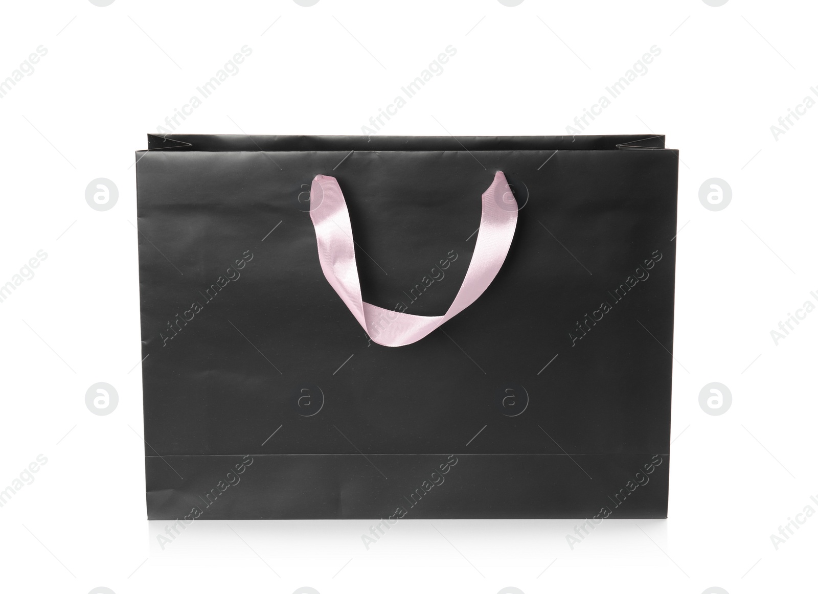 Photo of Paper shopping bag isolated on white. Mock up for design