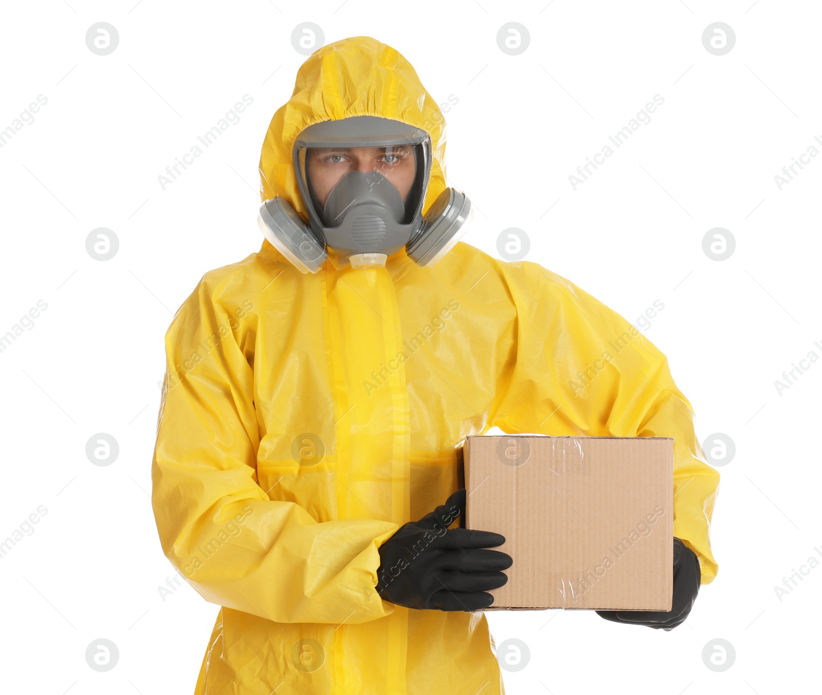 Photo of Man wearing chemical protective suit with cardboard box on white background. Prevention of virus spread