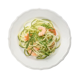 Tasty zucchini pasta with shrimps and arugula isolated on white, top view