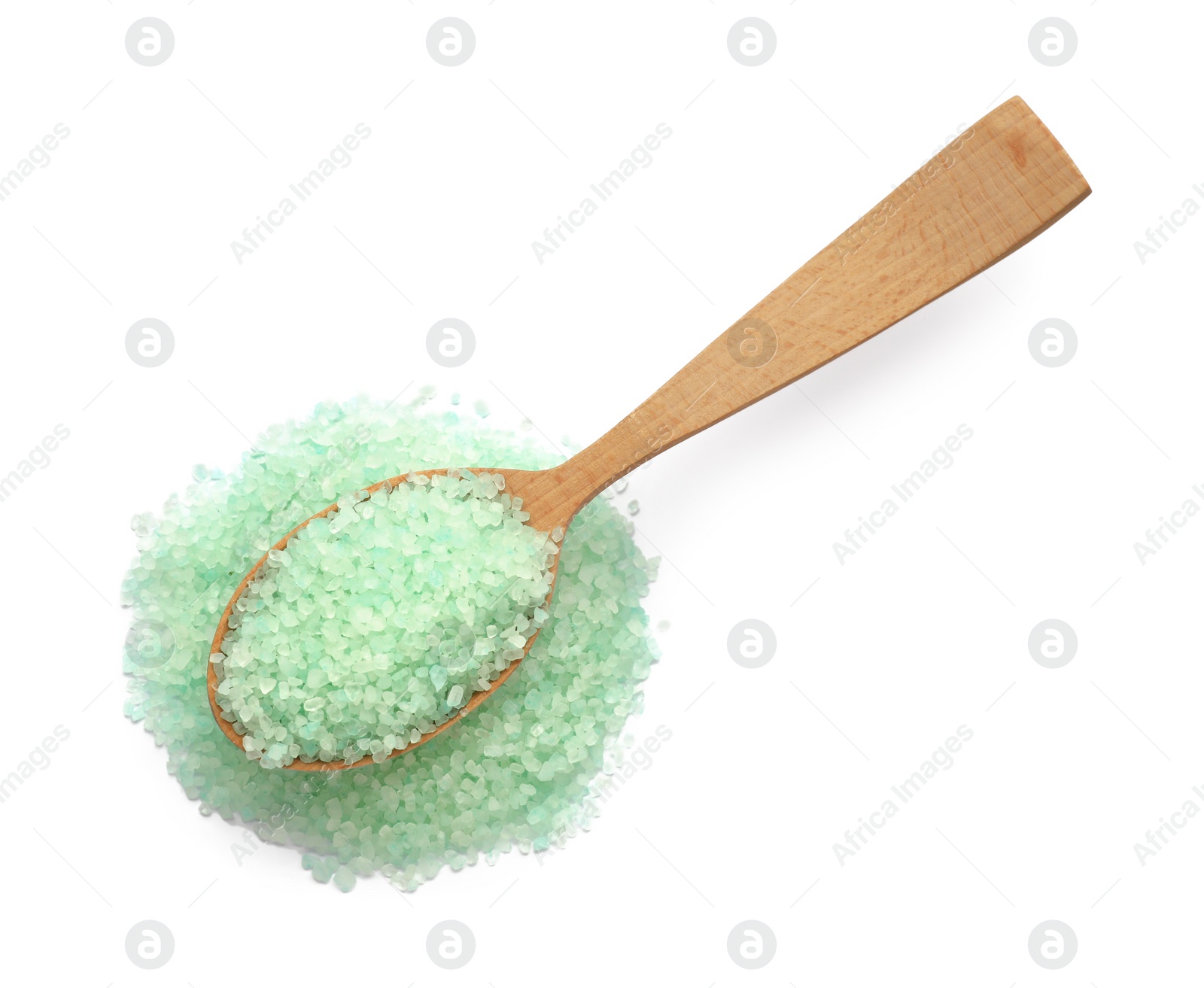 Photo of Turquoise sea salt and spoon isolated on white, top view