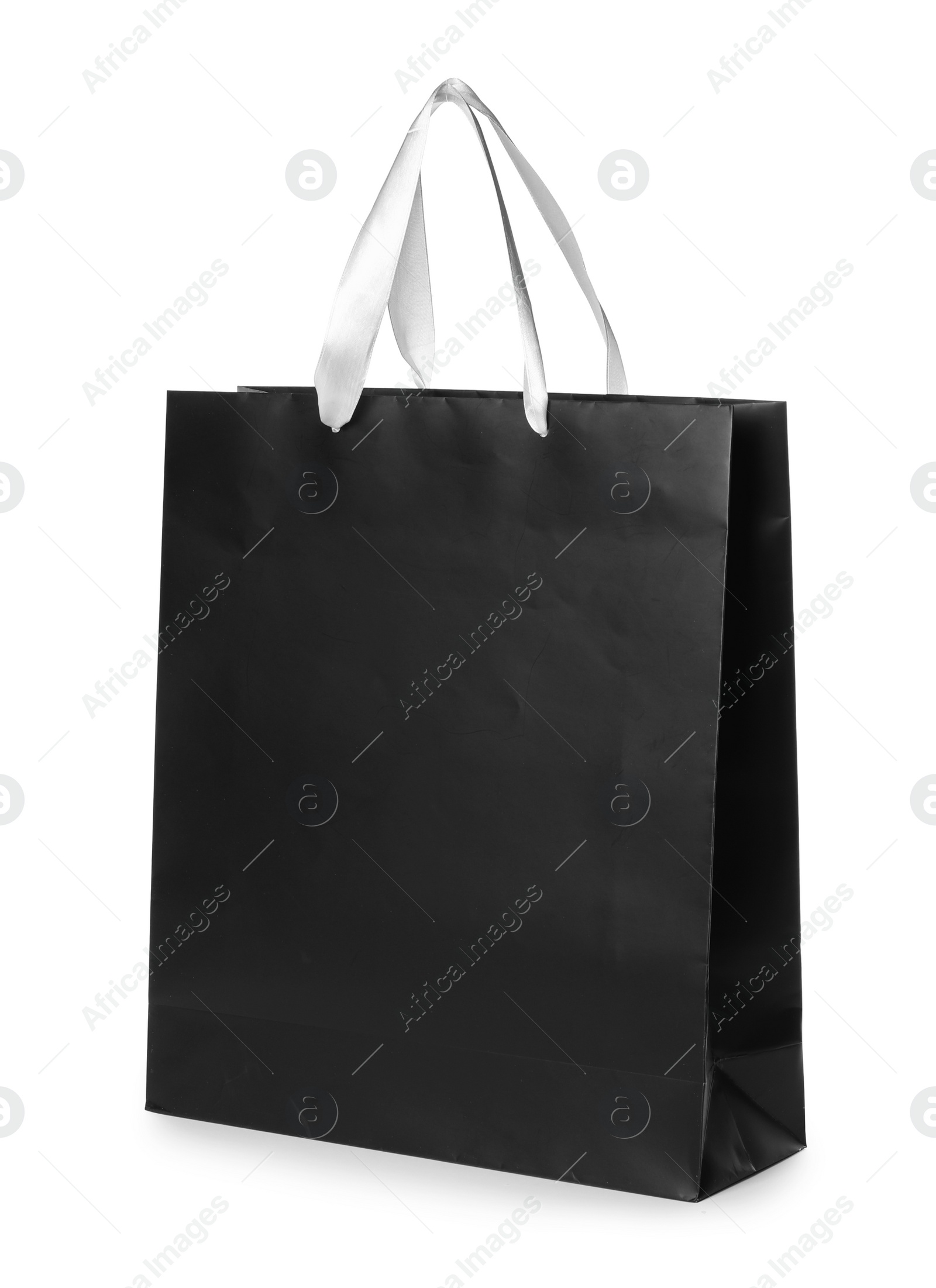 Photo of Paper shopping bag isolated on white. Mock up for design