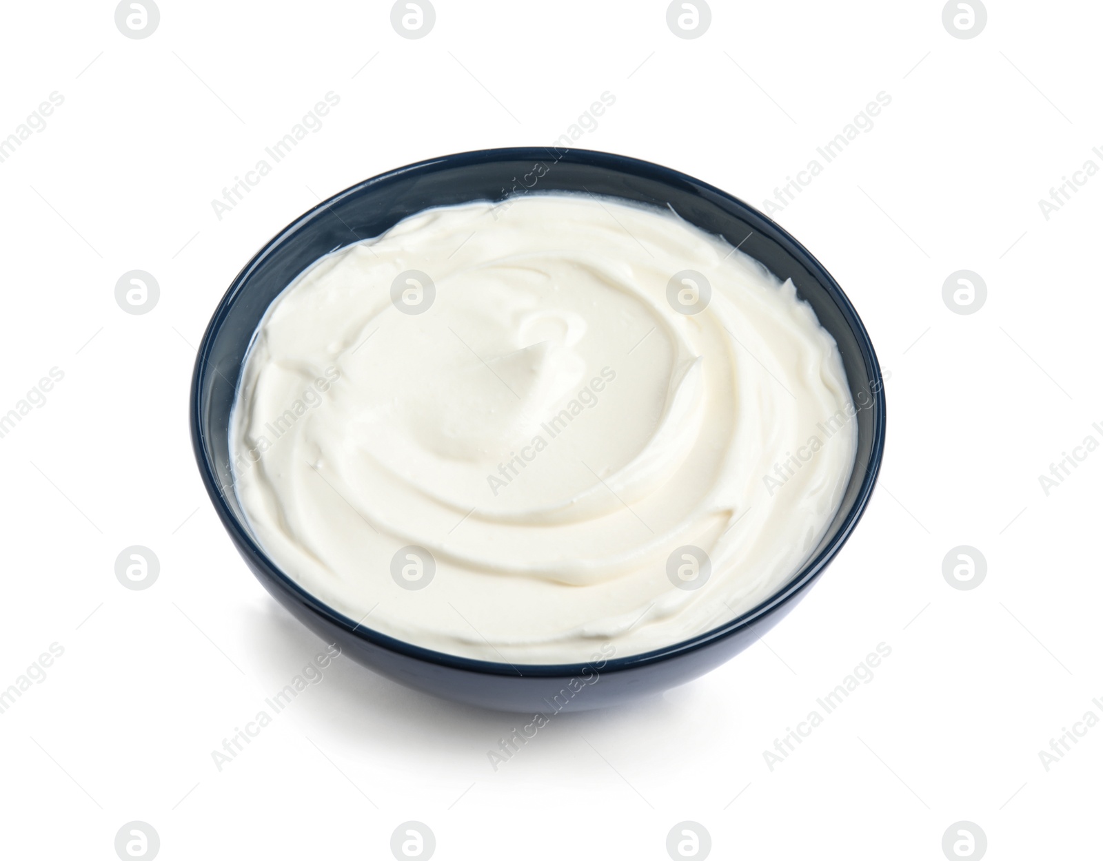 Photo of Bowl with fresh sour cream isolated on white