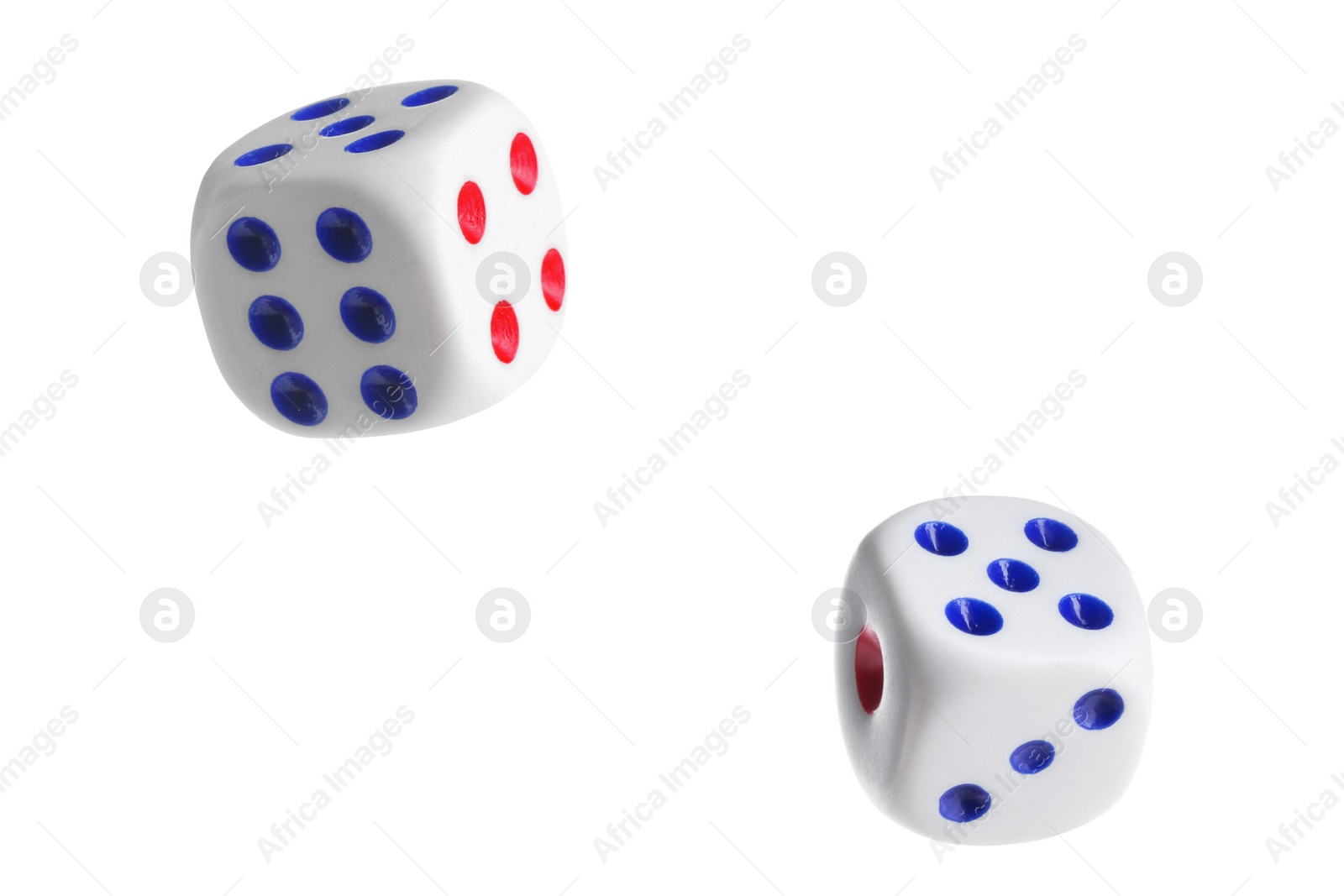 Image of Two dice in air on white background