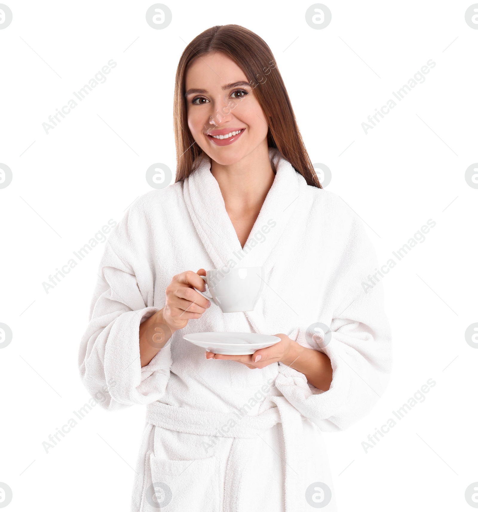 Photo of Young woman in bathrobe with cup of drink on white background