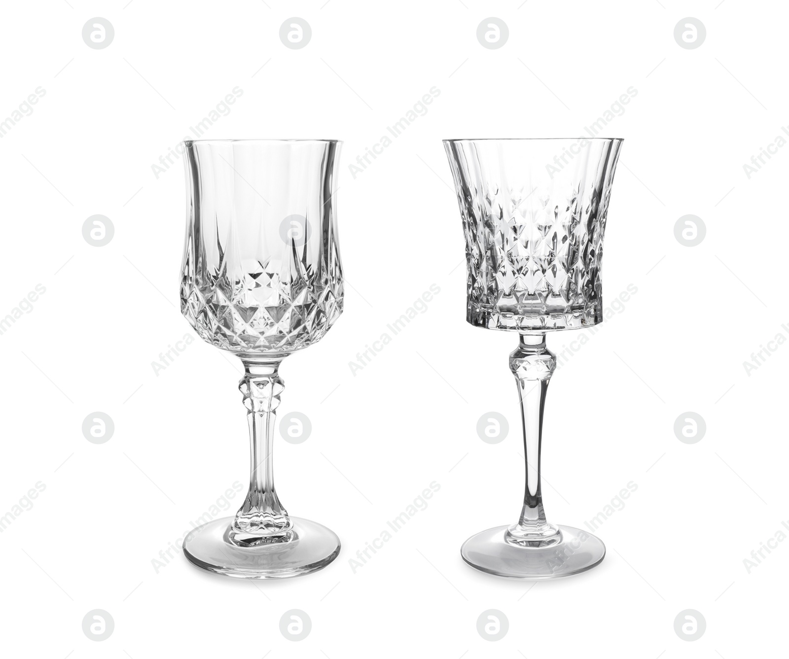 Image of Two beautiful empty glasses on white background