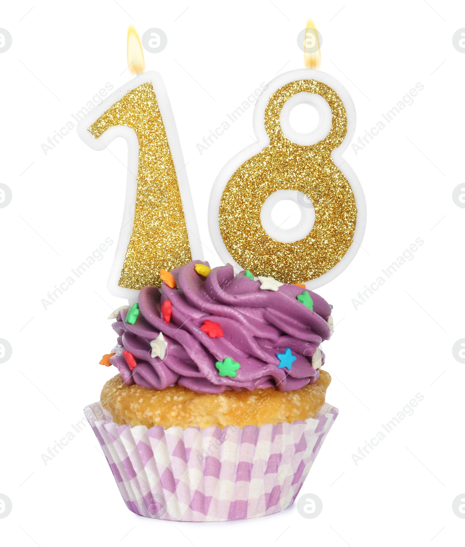 Photo of 18th birthday. Delicious cupcake with number shaped candles for coming of age party on white background