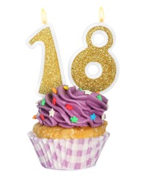 Photo of 18th birthday. Delicious cupcake with number shaped candles for coming of age party on white background