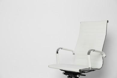 Comfortable office chair on white background, space for text