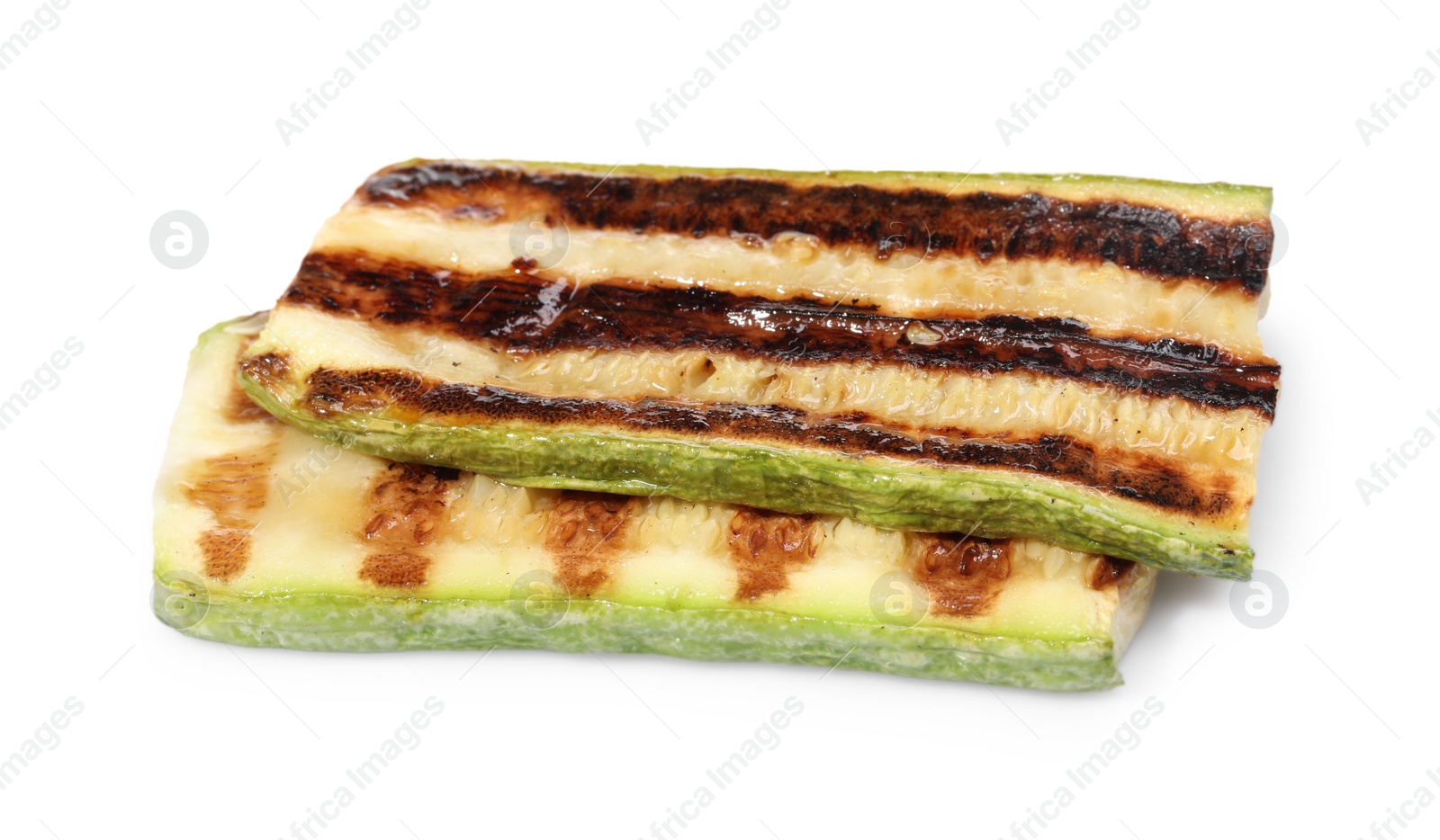 Photo of Slices of delicious grilled zucchini isolated on white