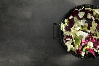 Photo of Delicious salad with Chinese cabbage, bell pepper and suluguni cheese on grey table, top view. Space for text