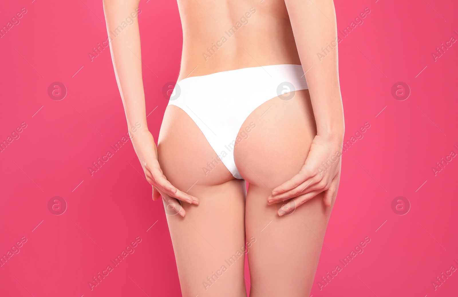 Photo of Slim young woman with smooth gentle skin on color background, closeup. Beauty and body care concept