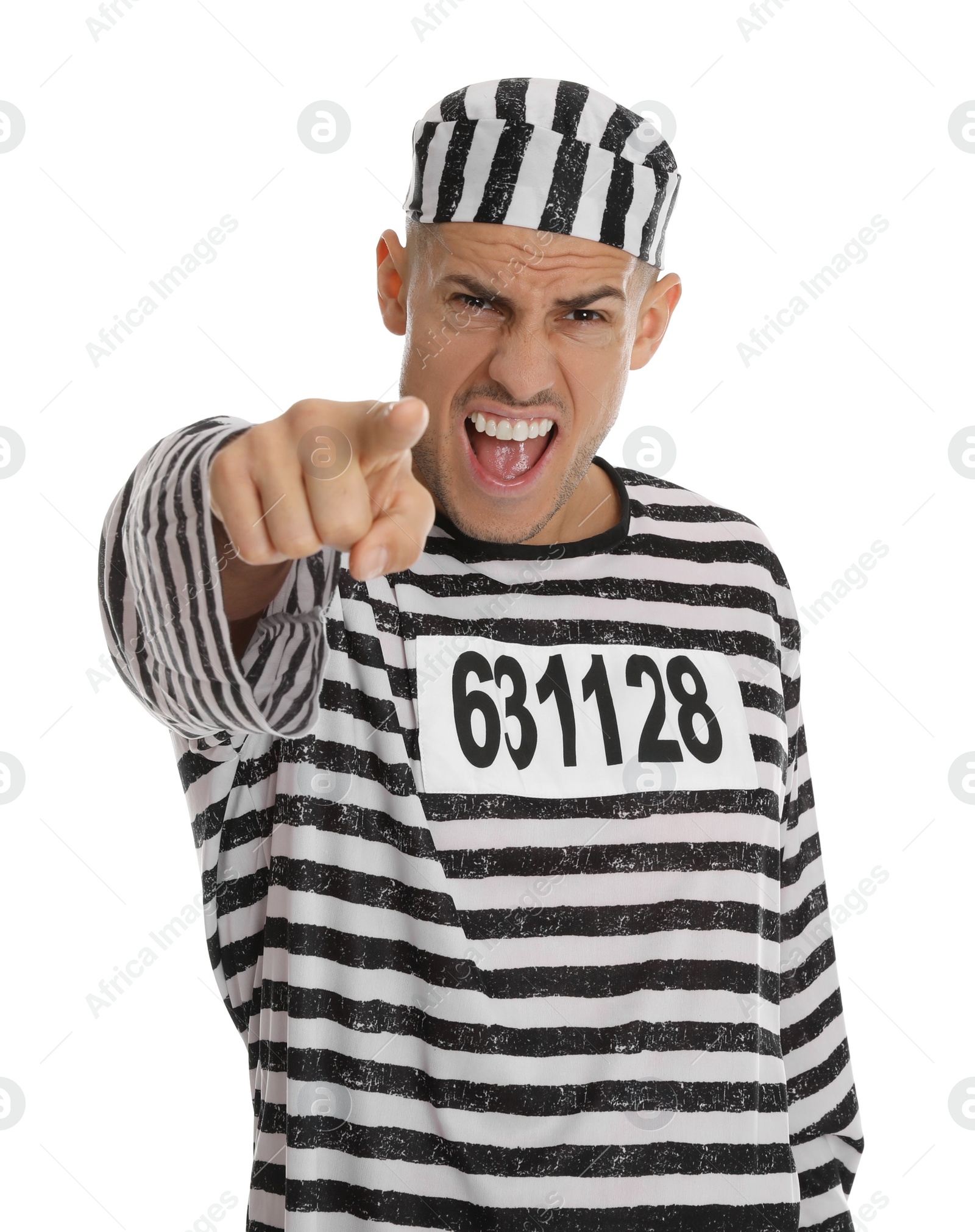 Photo of Emotional prisoner in striped uniform pointing at camera on white background