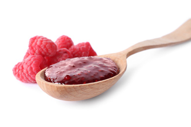 Delicious jam and fresh raspberries in wooden spoon on white background