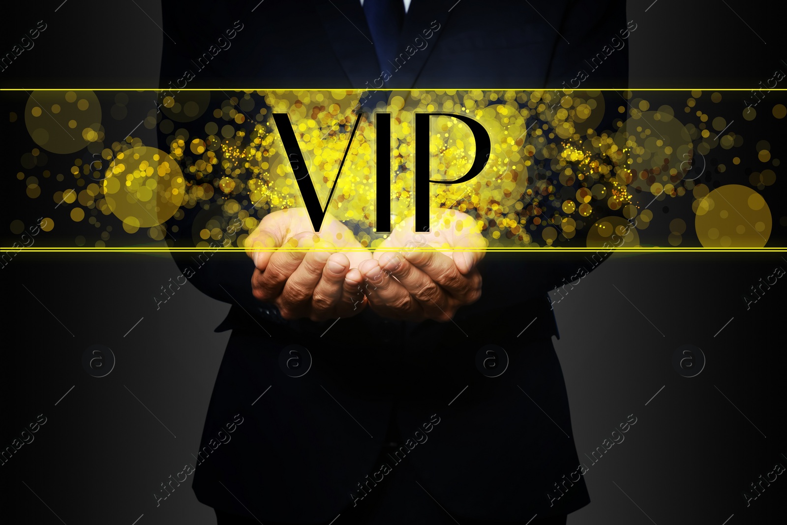 Image of VIP member. Closeup view of man showing virtual abbreviation on dark background