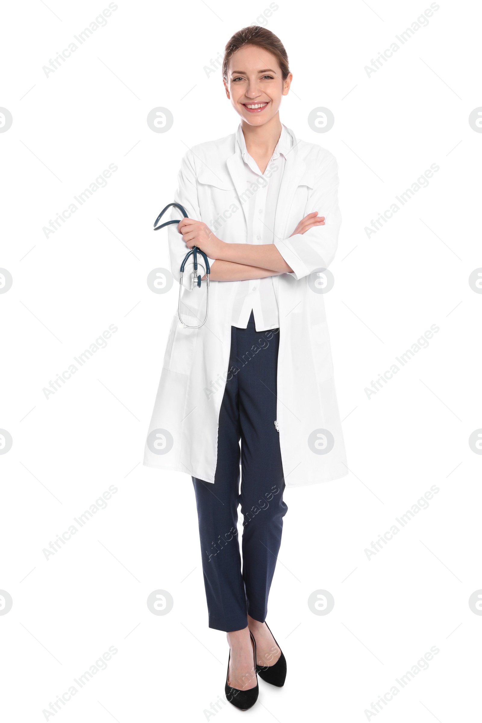 Photo of Full length portrait of medical doctor with stethoscope isolated on white