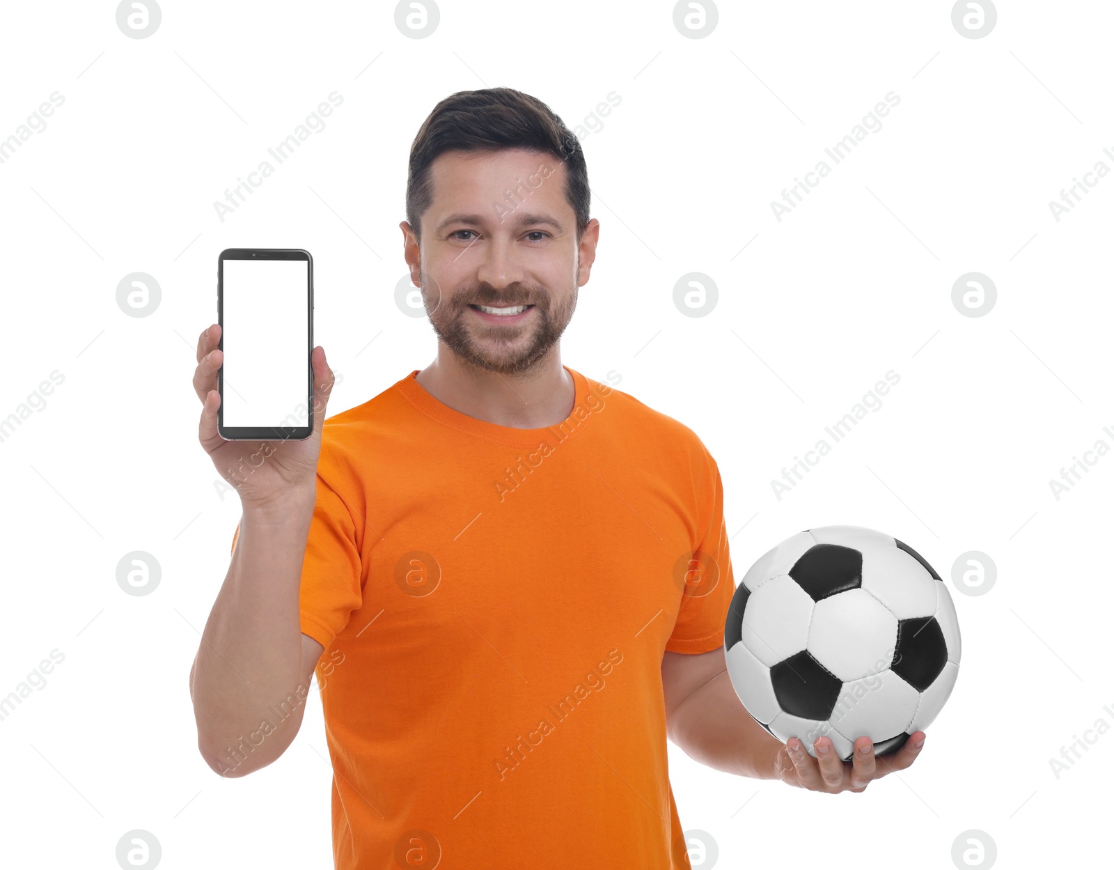Photo of Happy sports fan with ball and smartphone on white background