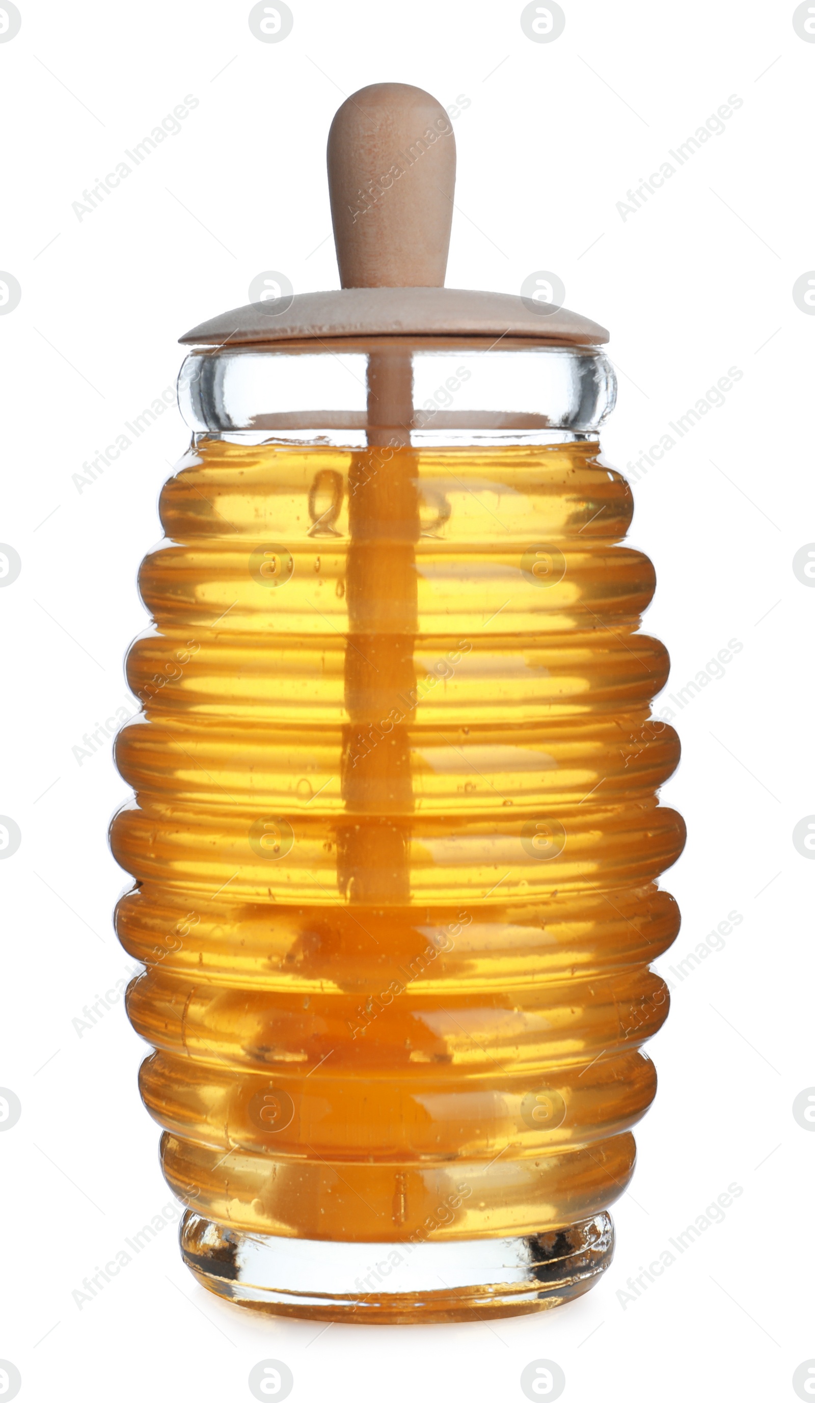 Photo of Jar of organic honey and dipper isolated on white