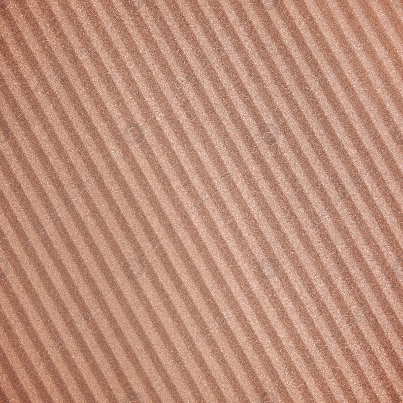 Image of Wall paper design. Brown corrugated sheet of cardboard as background