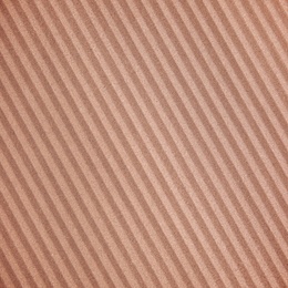 Image of Wall paper design. Brown corrugated sheet of cardboard as background