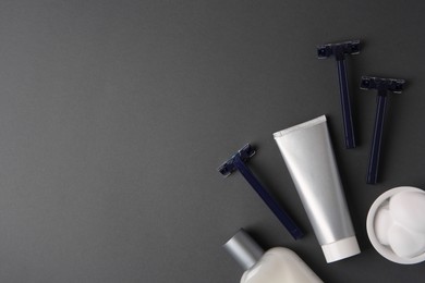 Photo of Flat lay composition with shaving accessories for men on grey background. Space for text