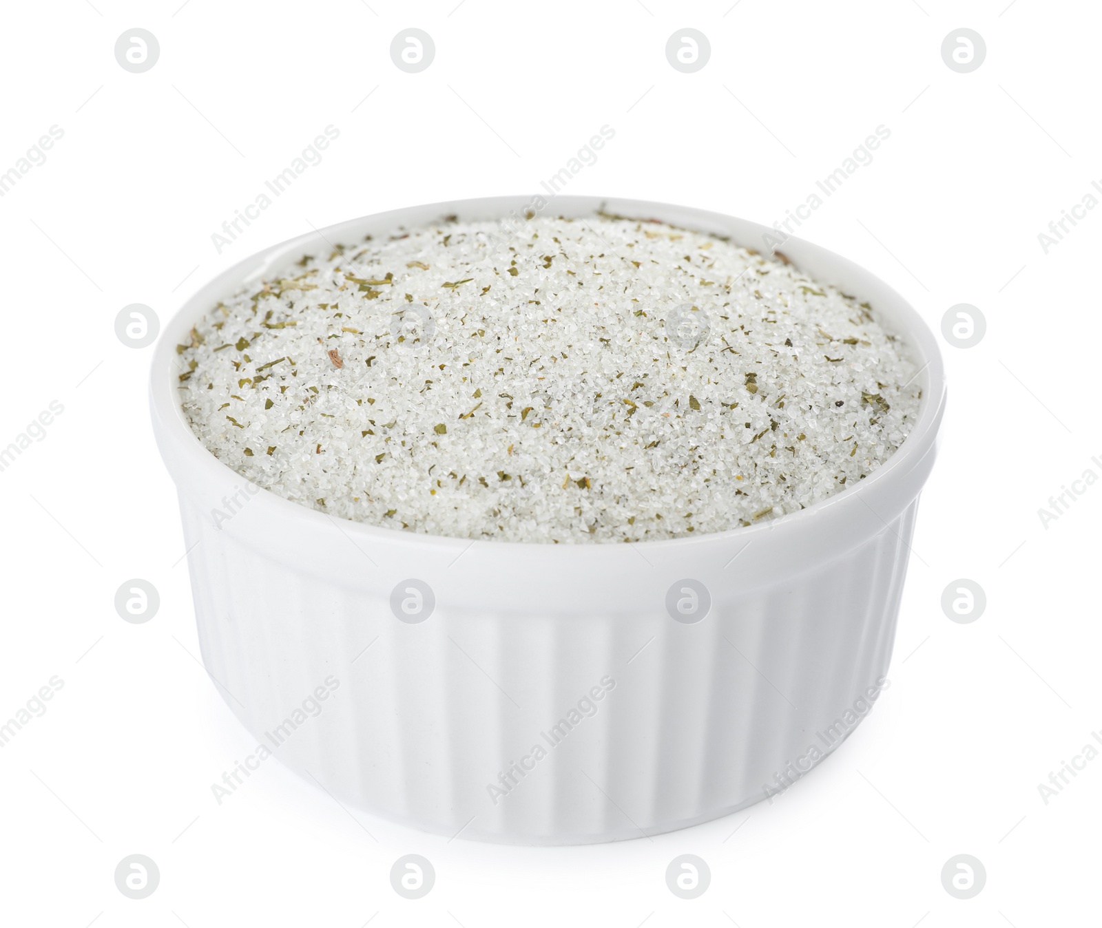 Photo of Natural herb salt in bowl isolated on white