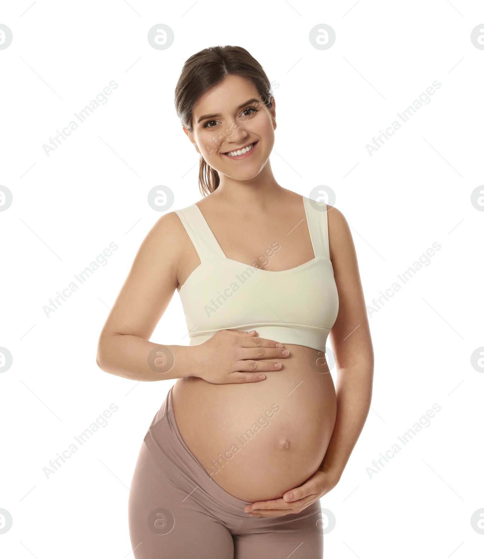 Photo of Happy young pregnant woman on white background