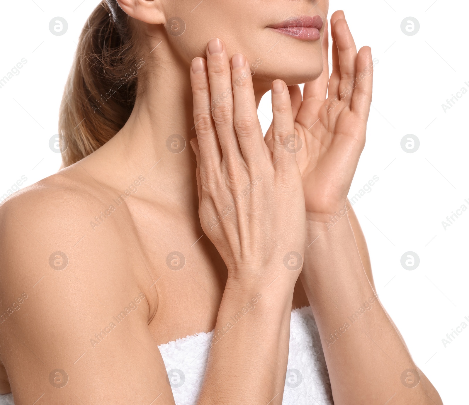 Photo of Woman massaging her face on white background, closeup