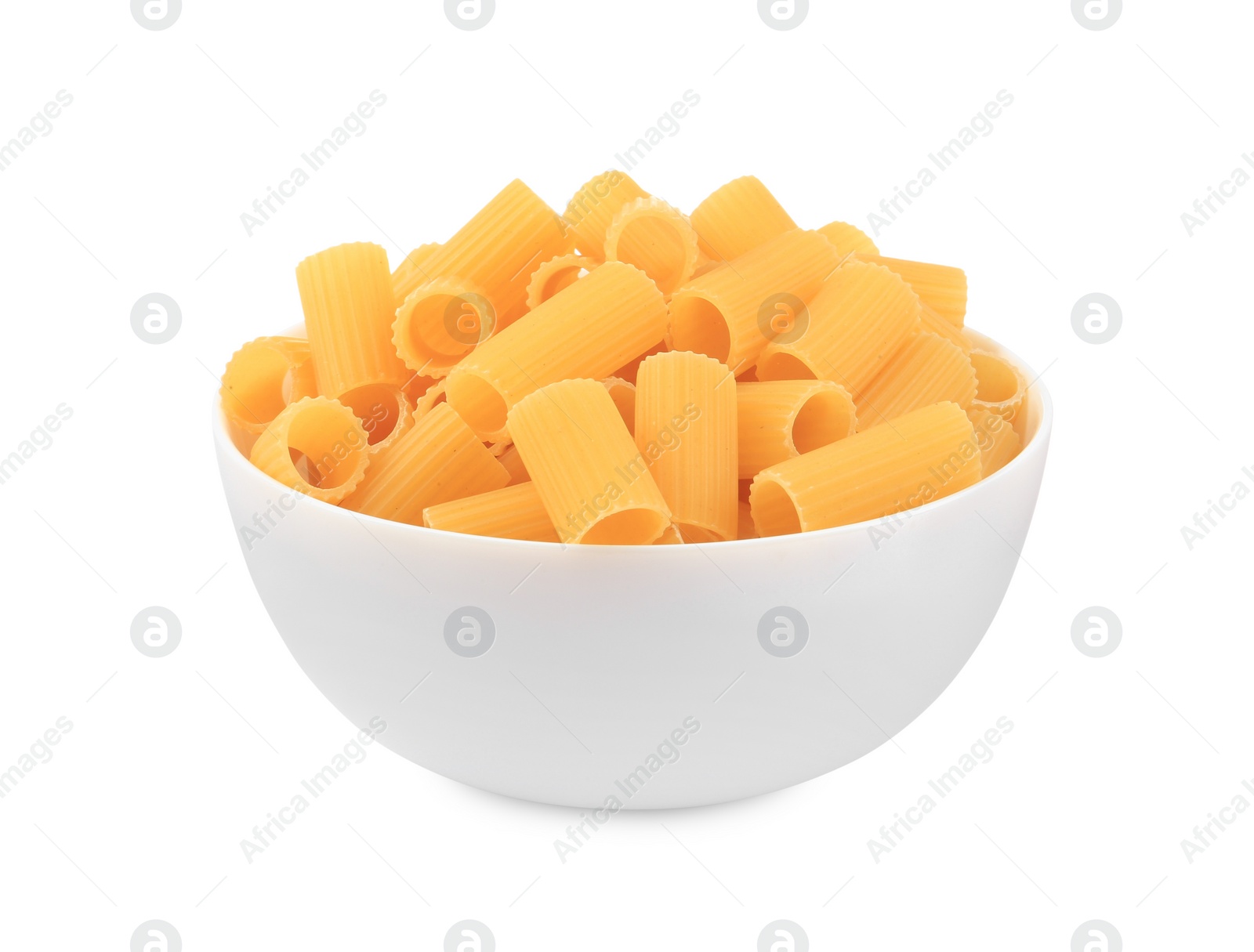 Photo of Raw rigatoni pasta in bowl isolated on white