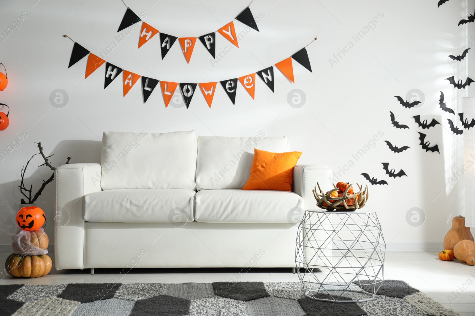 Photo of Modern room decorated for Halloween. Festive interior