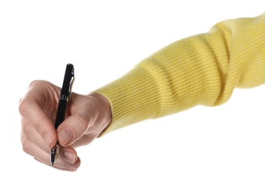 Woman holding pen on white background, closeup of hand