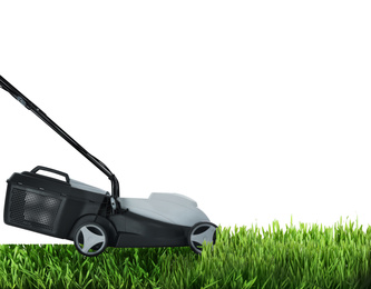 Image of Modern garden lawn mower cutting green grass, white background